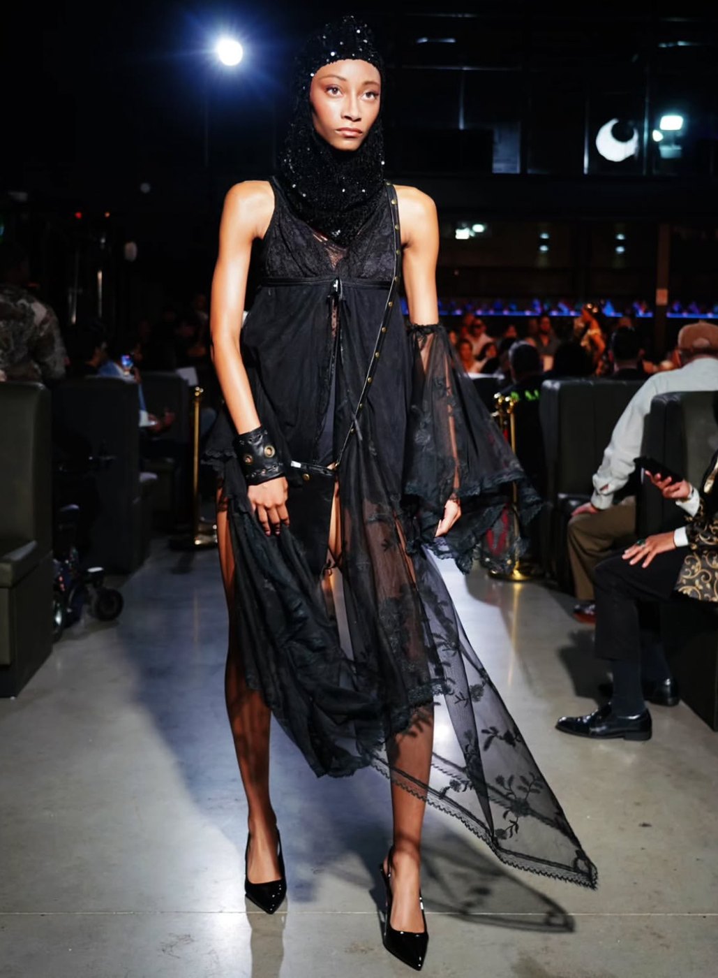 Sheer black lace dress with a sequin hood
