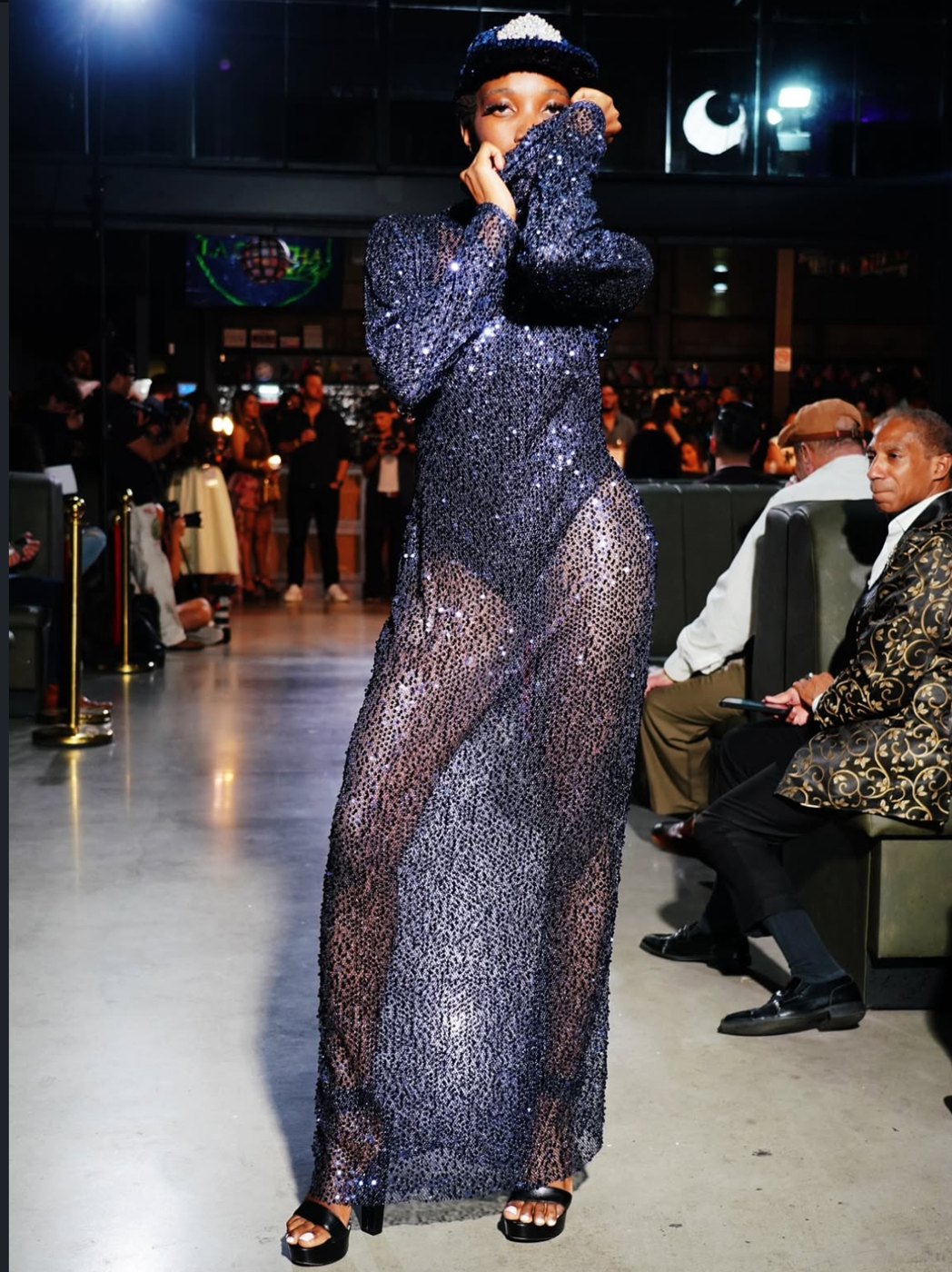 Sheer navy sequin gown with a matching cap