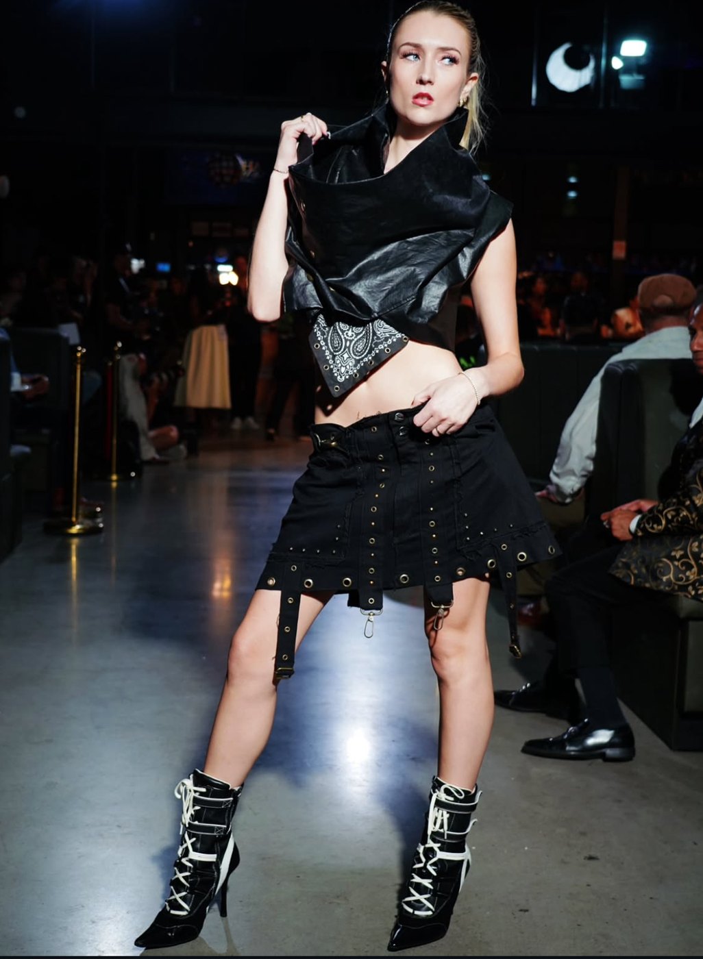 Sculptural leather top with a bandana and grommet skirt