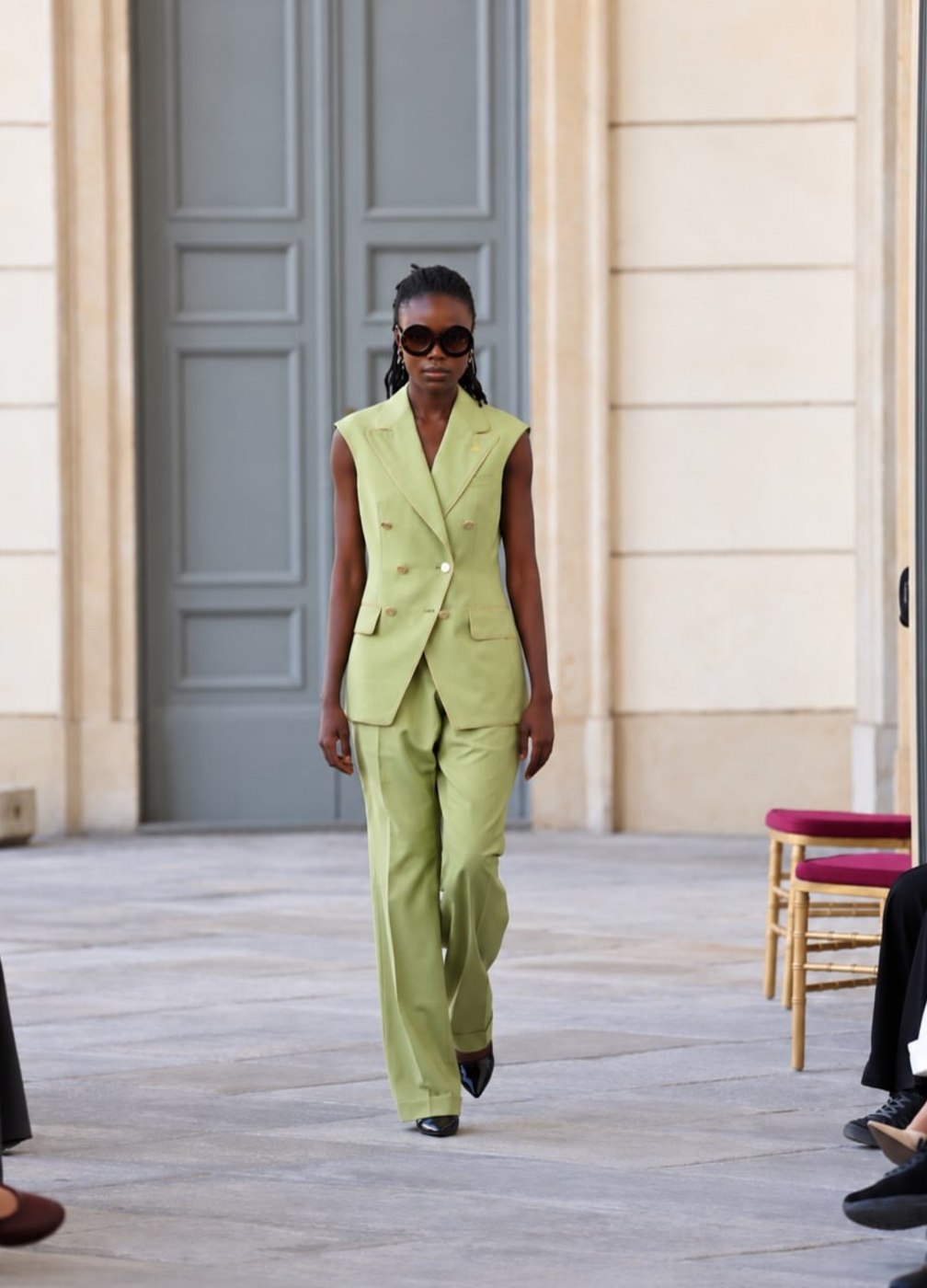 Sleeveless sage double-breasted vest and wide trousers with round sunglasses