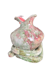 Ceramic vessel sculpture in pink and green